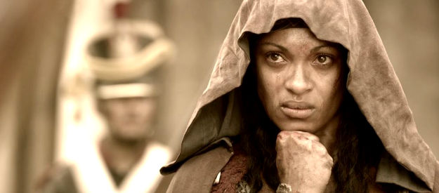 Cynthia Addai-Robinson as Emily West, watching her brother being executed at the Alamo in Texas Rising (2015)