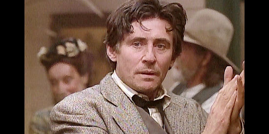 Gabriel Byrne as Teddy Blue, surprised to see Calamity Jane show up at his wedding in Buffalo Girls (1995)