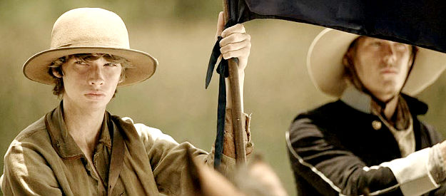 Jacob Lofland as Colby Pitt, the young ranger who winds up capturing Santa Anna in Texas Rising (2015)