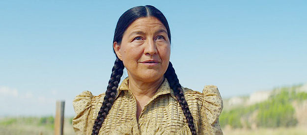 Kimberly Guerrero as Katie Clarke, the Indian wife of John Clarke and a woman fully aware of her husband's illegal activies in The English (2022)