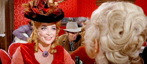 Marie Windsor as Goldie, the gal who plans to marry Latigo, if she can find him, in Support Your Local Gunfighter (1971)