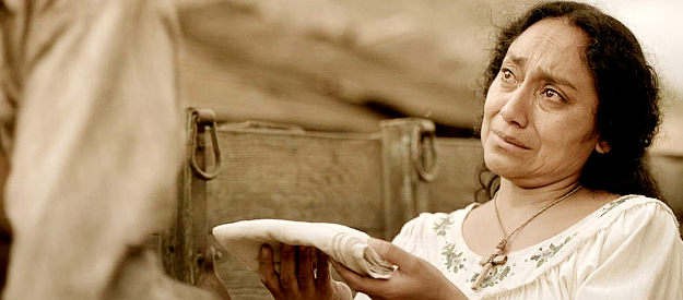 Mayra Serbulo as Guadalupe, bidding farewell to Ranger Deaf Smith in Texas Rising (2015)