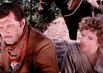 James Craig as Lt. Ezparza and Martha Roth as Angelica Chavez in Massacre (1956)