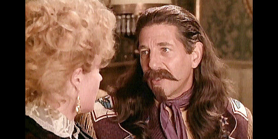Peter Coyote as Buffalo Bill Cody, sweet talking Dora DuFran in Buffalo Girls (1995)