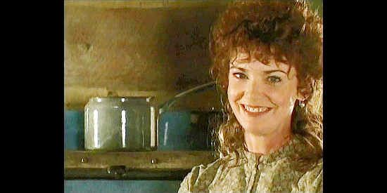 Radha Delamarter as Janie, Moses' wife in The Fight Before Christmas (1994)