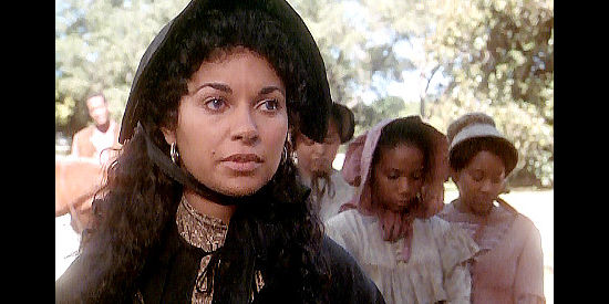 Salli Richardson-Whitfield as Martha, the mulato cousin and Georgia's servant in True Women (1997)