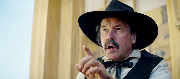 Stephen Rea as Sheriff Robert Marshall, making a point with Thomas Trafford over problems on his ranch in The English (2022)