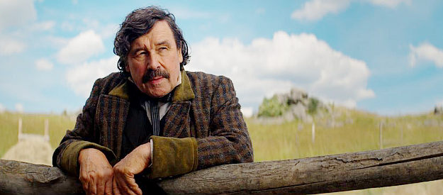 Stephen Rea as Sheriff Robert Marshall, trying to get to the bottom of all the trouble in Cain County in The English (2022)