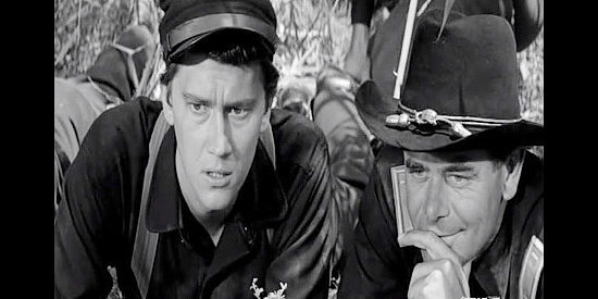 Andrew Prine as Pvt. Owen Sealous and Glenn Ford as Lt. Jared Heath, stealing a glance at some bathing beauties in Advance to the Rear (1964)