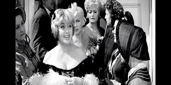 Joan Blondell as Easy Jenny, getting kicked out of town along with all of her girls of the night in Advance to the Rear (1964)