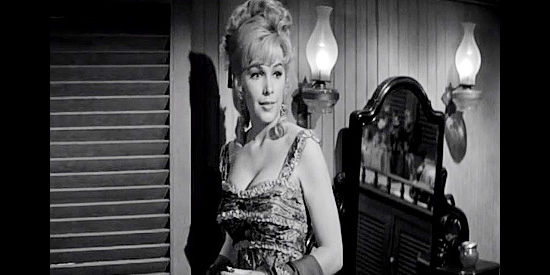 Stella Stevens as Rebel spy Mary Lou Williams, finding a surprise in her room, Union Lt. Jared Heath in Advance to the Rear (1964)