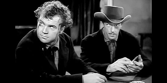 John Cason as Blazer and I. Stanford Jolley as Toad Tyler, about to frame the Abilene Kid in Rimfire (1949)