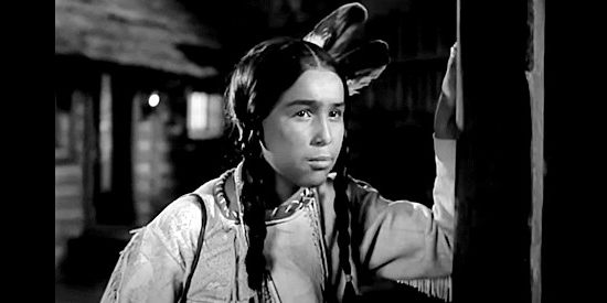 Martin Good Rider as Little Chief, watching his tribe attack the fort in Susannah of the Mounties (1939)