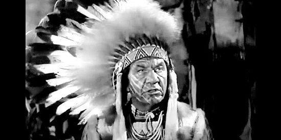 Maurice Moscovitch as Chief Big Eagle, leader of the Blackfeet, trying to figure out who's speaking with a forked tongue in Susannah of the Mounties (1939)