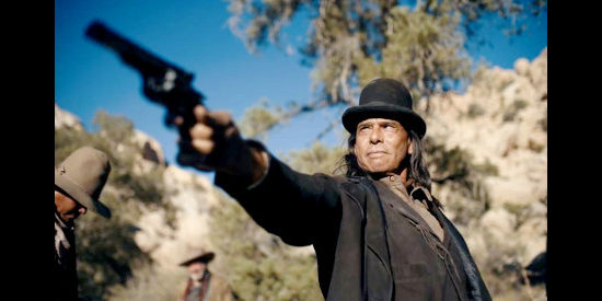 Raoul Max Trujillo as John Hyde, the Indian tracker determined to find WIllie Boy in The Last Manhunt (2022)