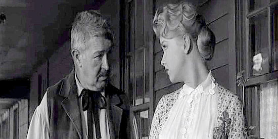 Robert Burton as Nathan Conroy, the uncle who gives Ellen (Anne Francis) refuge on his ranch in The Hired Gun (1957)