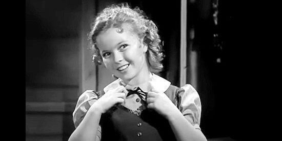Shirley Temple as Susannah Sheldon, all dressed up to impress Monty Montague in Susannah of the Mounties (1939)