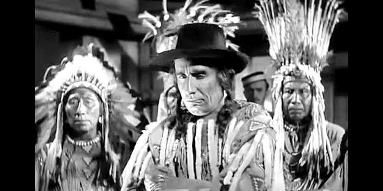 Victor Jory as Wolf Pelt, Chief Big Eagle's advisor and one of the men behind the trouble in Susannah of the Mounties (1939)