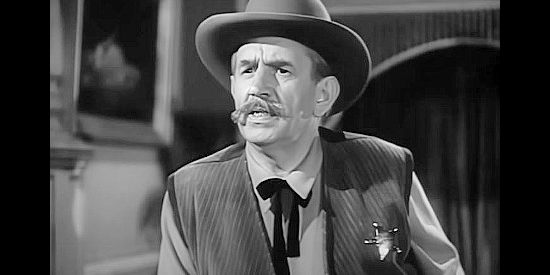 Victor Kilian as Sheriff Jim Jordan, finding himself with a string of murders to solve in Rimfire (1949)