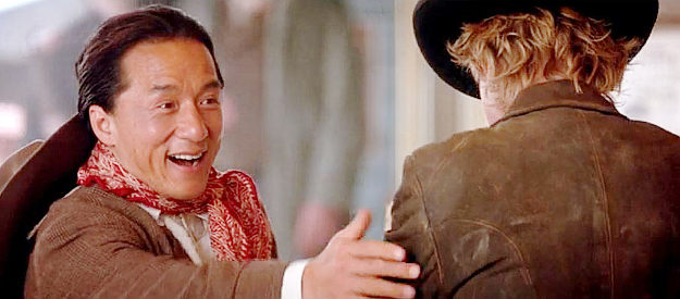Jackie Chan as Chon Wang, pleased to discover that his image is on a post too in Shanghai Noon (2000)