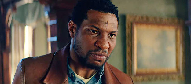 Jonathan Majors as Nat Love, sporting the scar Rufus Buck carved into his forehead years before in The Harder They Fall (2021)