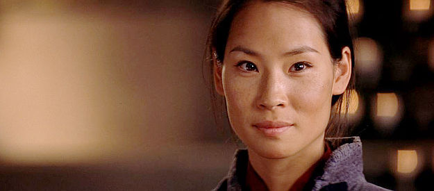 Lucy Liu as Princess Pei-Pei, pleased to hear she might now have to return to the homeland in Shanghai Noon (2000)