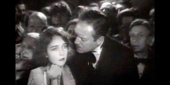 Mantagu Love as Wirt Roddy tries to comfort Letty Mason (Lillian Gish) as a cyclone rages outside in The Wind (1928)