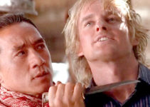 Jackie Chan as Chon Wang and Owen Wilson as Roy O'Bannon, their cowboy lessons off to a rocky start in Shanghai Noon (2000)