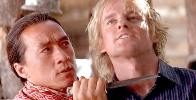 Jackie Chan as Chon Wang and Owen Wilson as Roy O'Bannon, their cowboy lessons off to a rocky start in Shanghai Noon (2000)