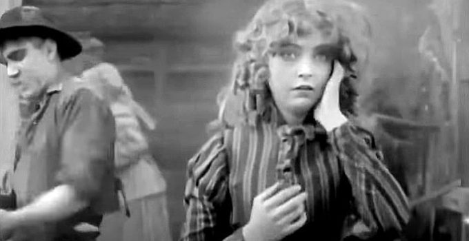 Lillian Gish as Melissa Harlow frets about what's happened to her child while the men try to defend the ranch house in The Battle of Elderbush Gulch (1913)