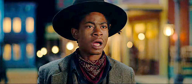 RJ Cyler as Jim Beckwourth, trying to lure Cherokee Bill into a gunfight in The Harder They Fall (2021)