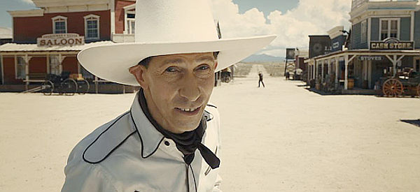 Tim Blake Nelson as Buster Scruggs, ready for another showdown in The Ballad of Buster Scruggs (2018)