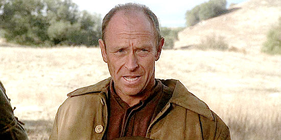 Corbin Bernsen as Ben Graham, sharing the news of Aaron's death with Marty Claridge in Love Comes Softly (2003)