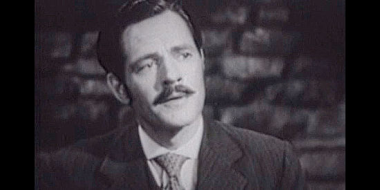 Donald Woods as Ralp C. Connors, the Indian agent plotting to get the Navajo mineral rights in Daughter of the West (1949)