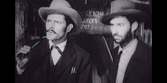 Donald Woods as Ralph C. Connors and James Griffith as Jed Morgan, growing wary of Navo in Daughter of the West (1949)