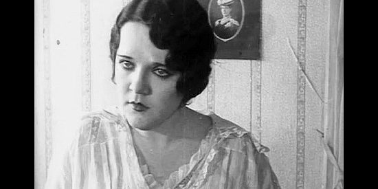 Doris Chadwick as Mary Merrell, learning she's not Dave's blood sister in Tracy the Outlaw (1928)