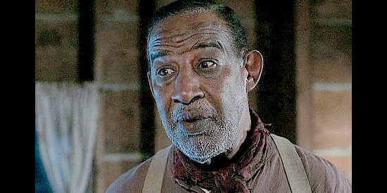 Frank McRae as Cookie, the aging cowpoke Willie hires to cook on his ranch in Love's Long Journey (2005)