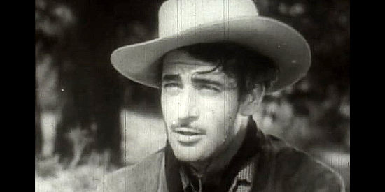 Gilbert Roland as Dick Ames, aka Arizona Lopez, a man with a score to settle in Thunder Trail (1937)