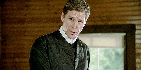 Hank Stratton as Pastor Joe, overseeing the adoption of orphans in Love's Unending Legacy (2007)