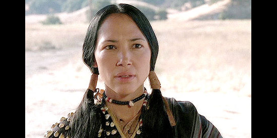 Irene Bedard as Mariam 'Red Hawk' McCalin, Missie's neighbor, offering assistance in Love's Long Journey (2005)