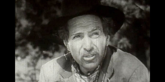 J. Carrol Naish as Rafael Lopez, the wandering prospector who adopts Dick Ames in Thunder Trail (1937)