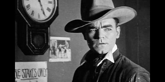 Jack Hoey as Harry Tracy, determined to win back his money in Tracy the Outlaw (1928)