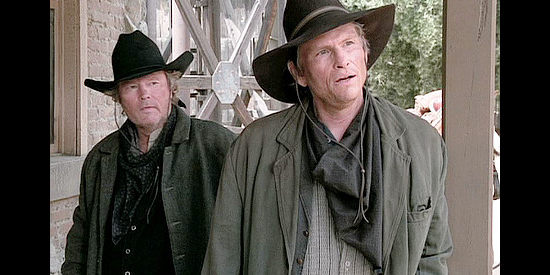 John Savage as Trent and Jeff Kober as Pacey, local trouble makers in Love's Long Journey (2005)