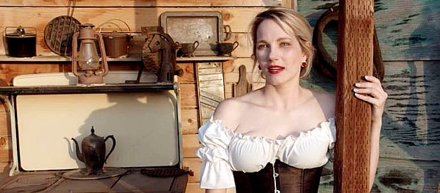 Katrina F. Kelly as Mae, the saloon girl Belle MacLure befriends in For the Reward (2022)