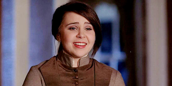 Mae Whitman as Colette Doros, thrilled at a kind gesture suggested by her father in Love's Abiding Joy (2006)