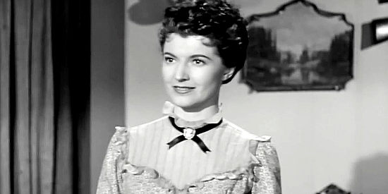 Margia Dean as Pat Wells, in love with Johnny Rush but promised to another man in The Lonesome Trail (1955)