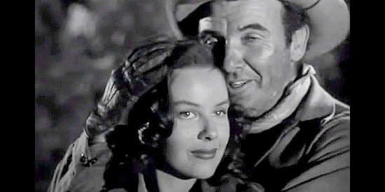 Mary Stuart as Margarita and Preston Foster as Scotty Mason, enjoying a tender moment in Thunderhoof (1948)