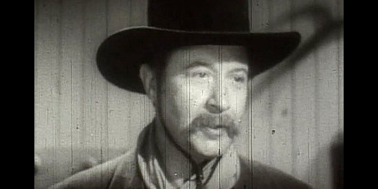 Monte Blue as Jeff Graves, Lee Tate's right-hand man when it comes to causing trouble in Thunder Trail (1937)