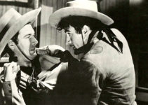 James Craig as Bob Tate and Gilbert Roland as Dick Ames in Thunder Trail (1937)