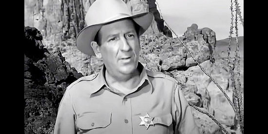 Paul Ford as Sheriff Lynn Early, a lawman with a new set of Lost Dutchman Mine killings to solve in Lust for Gold (1949)